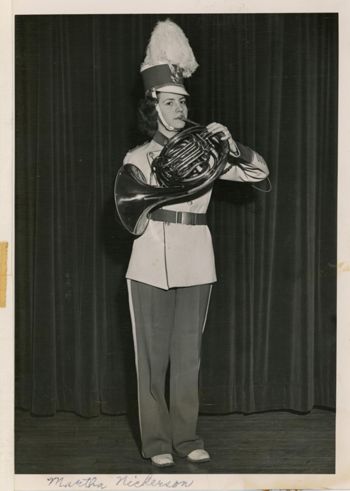Martha Nickerson Omaha, French Horn.
      <br/>She wears the standard inside uniform. 1944. 