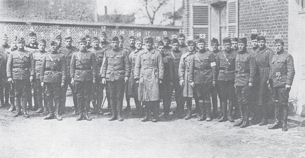 G.P. Cather (no. 4) with other officers of the First Battalion of the Twenty-sixth Infantry Regiment, at Haudivillers, France, April 1918.