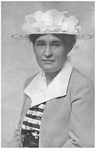 Bust-length studio portrait of Willa Cather in July 1915 used as publicity photograph for The Song of the Lark.