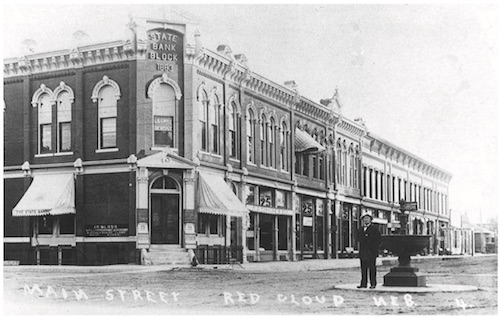 Photography of Red Cloud, NE, circa 1900 with handwritten caption: "MAIN STREET RED CLOUD NEB."