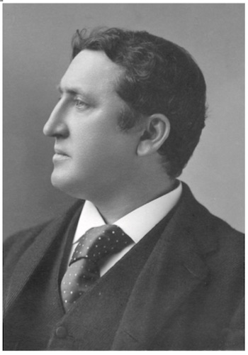 Bust-length studio portrait of James Gibbons Huneker circa 1890.