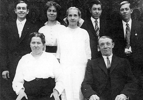 Image of The Landwehrkamps, Back row: (l-r) Heine, Minnie (grandmother), Fritz, and John. Center: Grace (great-aunt)Front: (l-r) Katherine and Henry (great-grandparents)