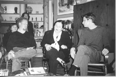 Image of Andy Jewell (left) and Michael Schueth (right) visit with Joan Acocella