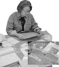 Image of Susan Rosowski explores the collection's extensive letters and pictures. (Courtesy Richard Wright)