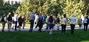 Image of Colloquium members walking across the UNL campus