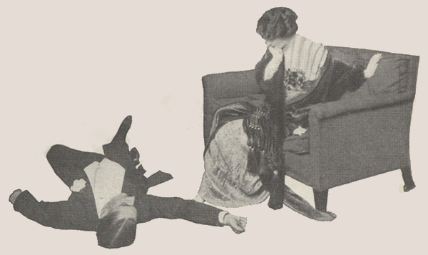 Jane Cowl looking with surprise at man lying on the floor.