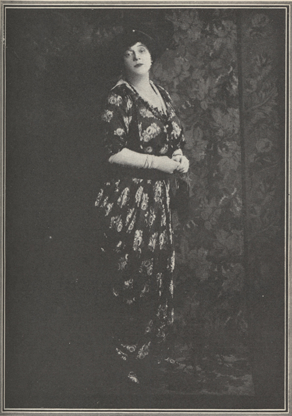 Full-length photograph of Mrs. Campbell as Eliza in an elaborate costume.