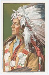 Native American man wearing headdress