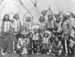 Native Americans in front of tipis