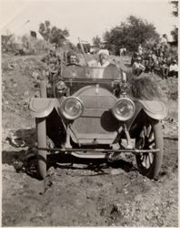 William F. Cody dressed as Santa Claus and riding in an open automobile near Oracle, Arizona