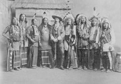 William F. Cody with eight Native Americans