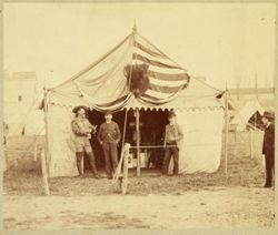 William F. Cody near his tent in the back lot of the wild west show