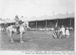 William F. Cody on horseback addresses citizens of Clinton, Iowa