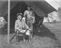 William F. Cody and man in doorway of tent at Buffalo Bill's Wild West