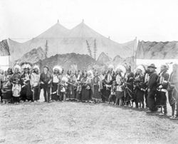 William F. Cody with several Native Americans in Buffalo Bill's Wild West arena